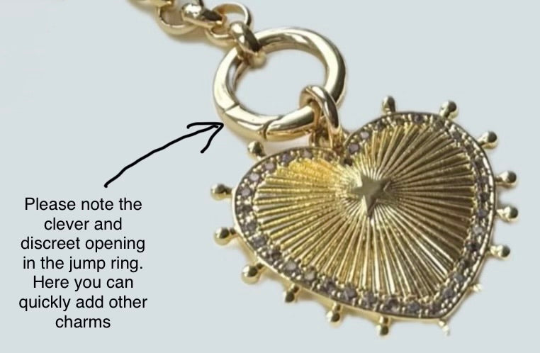 Sunburst Bracelet in Gold with a Circle of Tiny Quartz Stones.