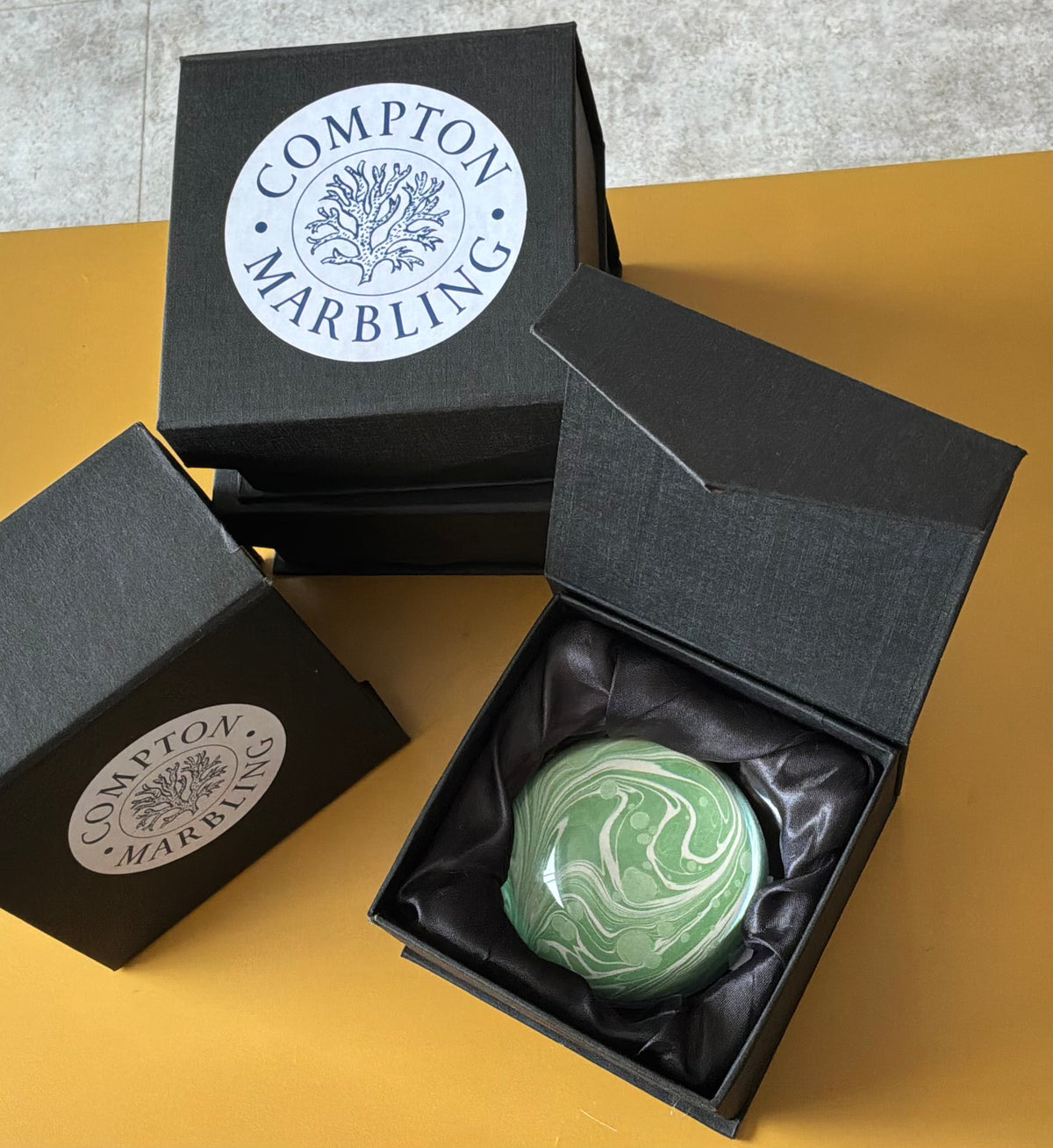 Compton Marbling Glass Paperweight, Shades of Green and Ivory make this Interesting Pattern.