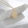 Token charm necklace, wagon wheel, gold vermeil